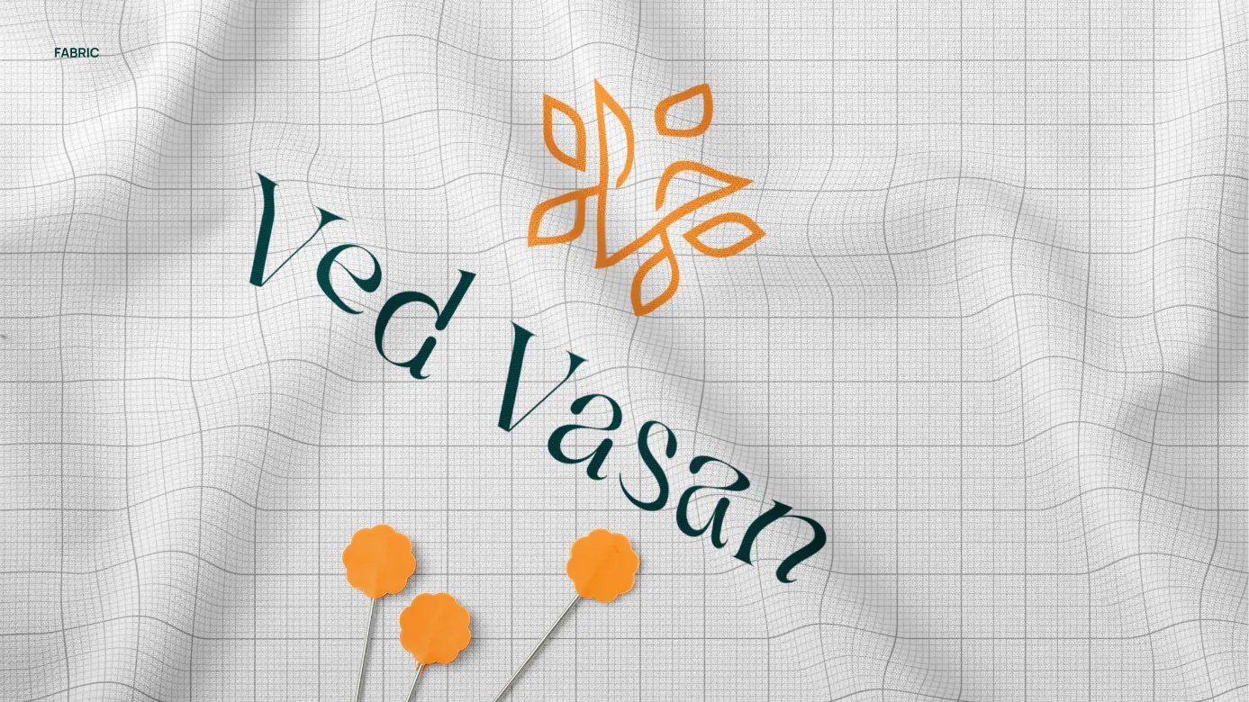 The Ved Vasan mark and name on fabric